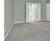 Neutral main bedroom with soft carpeting, with a view of the adjoining bath at 3401 Ravensworth Trce, Kennesaw, GA 30144