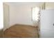 Empty bedroom with wood-look floors, bright walls, and new dresser at 5024 Park Ave, Forest Park, GA 30297