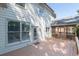 Back exterior view with deck and screened porch at 5405 Preserve Cir, Johns Creek, GA 30005