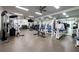 Community gym featuring workout equipment, weights, and mirrors at 5405 Preserve Cir, Johns Creek, GA 30005