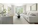 Bright living room featuring neutral furniture, large windows, hardwood floors, and a cozy seating area at 5405 Preserve Cir, Johns Creek, GA 30005