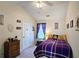 Well lit bedroom with decorated walls, and bright lighting at 542 Simonton Ridge Trl, Lawrenceville, GA 30045
