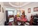 Inviting dining area with hardwood floors and seamless flow to the kitchen at 542 Simonton Ridge Trl, Lawrenceville, GA 30045