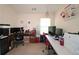 Bright office featuring multiple desks and chairs, perfect for remote work at 542 Simonton Ridge Trl, Lawrenceville, GA 30045