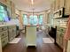 Well-lit kitchen with updated appliances and an eat-in dining area at 1835 Penrose Ct, Powder Springs, GA 30127