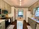Bright kitchen featuring stainless steel appliances and an adjoining dining area at 1835 Penrose Ct, Powder Springs, GA 30127