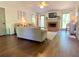Bright living room with fireplace, comfortable seating, and hardwood floors at 1835 Penrose Ct, Powder Springs, GA 30127
