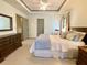 Inviting main bedroom features a dresser, a comfortable bed, and ensuite bathroom access at 1835 Penrose Ct, Powder Springs, GA 30127