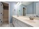 Bathroom featuring double sinks, and doorway to a shower and toilet space at 2023 Reserve Pkwy, Mcdonough, GA 30253