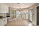 Bright kitchen breakfast area with large windows and backyard views at 2023 Reserve Pkwy, Mcdonough, GA 30253