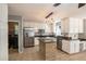 Modern kitchen with stainless steel appliances, white cabinets, and central island at 2023 Reserve Pkwy, Mcdonough, GA 30253
