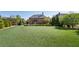 Large, well-maintained backyard offers ample space for recreation and outdoor enjoyment at 2199 Tayside Nw Xing, Kennesaw, GA 30152