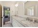Elegant bathroom featuring double sinks, marble countertops, and modern fixtures giving a spa-like experience at 2199 Tayside Nw Xing, Kennesaw, GA 30152