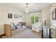 Inviting bedroom with unique bedframe, chandelier, and natural light creating a cozy and playful space at 2199 Tayside Nw Xing, Kennesaw, GA 30152