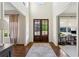 Spacious foyer with dark wood floors, a tall ceiling, and an ornate front door at 2199 Tayside Nw Xing, Kennesaw, GA 30152