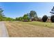 Scenic view of the golf course showcasing lush greenery and a premium residential property at 2199 Tayside Nw Xing, Kennesaw, GA 30152