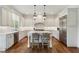 Beautiful kitchen with white cabinets, stainless steel appliances, marble countertops, and a center island at 2199 Tayside Nw Xing, Kennesaw, GA 30152