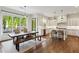 Eat-in kitchen features new appliances, an island with bar seating, a breakfast area and view of backyard at 2199 Tayside Nw Xing, Kennesaw, GA 30152