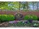 Welcome to Overlook at Marietta Country Club sign surrounded by colorful flower beds and manicured greenery at 2199 Tayside Nw Xing, Kennesaw, GA 30152