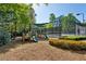 Community playground with slides and various play structures for fun in a well-maintained area at 2199 Tayside Nw Xing, Kennesaw, GA 30152