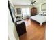 Bright bedroom features a large window and a ceiling fan for enhanced air circulation at 4025 Mcdowell Dr, Acworth, GA 30101