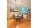 Well-lit dining area with a table and chairs next to the kitchen at 4025 Mcdowell Dr, Acworth, GA 30101