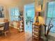 Charming dining area with ample natural light from the surrounding windows at 4025 Mcdowell Dr, Acworth, GA 30101