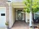 Welcoming front entrance with tiled porch, classic brick, and stylish glass front door at 4025 Mcdowell Dr, Acworth, GA 30101