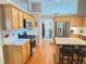 Well-lit kitchen featuring stainless steel appliances, granite countertops, and wood cabinets at 4025 Mcdowell Dr, Acworth, GA 30101