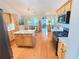 Well-lit kitchen with granite counters, stainless steel appliances, and center island at 4025 Mcdowell Dr, Acworth, GA 30101