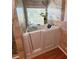 Modern bathroom with a walk-in tub and tile accents at 4025 Mcdowell Dr, Acworth, GA 30101