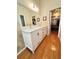 Bathroom with double vanities, tile accents, and a walk-in closet, perfect for a couple at 4025 Mcdowell Dr, Acworth, GA 30101