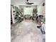 Spacious sunroom with tile flooring and ample natural light offers a versatile living space at 4025 Mcdowell Dr, Acworth, GA 30101