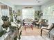 Bright sunroom with comfortable seating, perfect for enjoying natural light and tranquility at 4025 Mcdowell Dr, Acworth, GA 30101