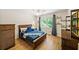 Bedroom with wood furnishings and natural light, perfect for a  at 4841 Village North Ct, Atlanta, GA 30338