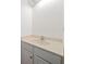 Clean bathroom featuring a white vanity, light countertop, and simple sink at 946 Steadman Ter, Marietta, GA 30064