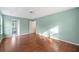 This main bedroom boasts hardwood floors and an ensuite bathroom at 946 Steadman Ter, Marietta, GA 30064