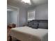 A bright bedroom showcases a well-lit space with a comfortable bed and hardwood flooring at 2007 Mesa Se Dr, Atlanta, GA 30316