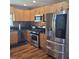 Updated kitchen with stainless steel appliances, abundant counter space, and modern cabinets at 2007 Mesa Se Dr, Atlanta, GA 30316