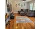 Comfortable living room with hardwood floors, sectional sofa, and decorative accents at 2007 Mesa Se Dr, Atlanta, GA 30316