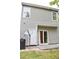 Exterior view of back of home showing the patio, door and windows at 2225 Bigwood Trl, Atlanta, GA 30349