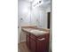 Traditional bathroom featuring a wooden vanity with laminate countertop and round sink at 2225 Bigwood Trl, Atlanta, GA 30349