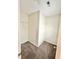 Walk-in closet features carpet flooring, white walls, and wire shelving for optimal storage at 2225 Bigwood Trl, Atlanta, GA 30349