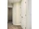 Hallway with carpeted floor and large closet at 2225 Bigwood Trl, Atlanta, GA 30349