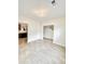 Open floor plan with luxury vinyl plank floors, access to the kitchen and stairway at 2225 Bigwood Trl, Atlanta, GA 30349