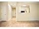 Bright living room with wood-look floors open to the kitchen at 2225 Bigwood Trl, Atlanta, GA 30349