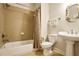 Cozy bathroom with shower over bath, tile flooring, and decorative mirror at 225 Mystic Ridge Hl, Sandy Springs, GA 30342