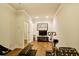 Bright exercise room with hardwood floors, workout equipment, and natural light at 225 Mystic Ridge Hl, Sandy Springs, GA 30342