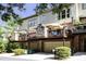 Townhome with multi-level decks and garage, offering outdoor space and parking at 225 Mystic Ridge Hl, Sandy Springs, GA 30342