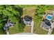 Expansive property featuring a well-maintained lawn, trees, and a lovely home with a long driveway at 1213 Blue Springs Dr, Loganville, GA 30052
